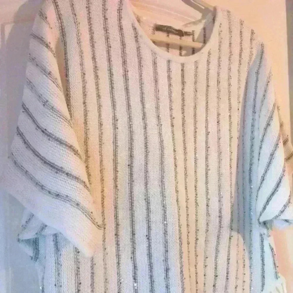 White Boho sweater with fringe. Sequin detail Dolman sleeves. - Picture 5 of 12